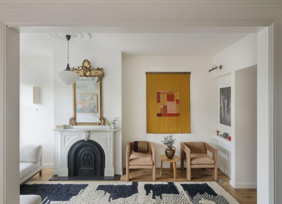 a living room with a fireplace