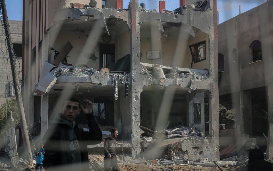 Destroyed apartments in a residential housing block following Israeli airstrikes in Khan Younis, Gaza