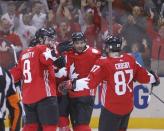 Sep 24, 2016; Toronto, Ontario, Canada; Team Canada defenseman Drew Doughty (8) and forward Patrice Bergeron (37) and forward Sidney Crosby (87) celebrate a goal by Team Canada forward Brad Marchand (not pictured) against Team Russia during a semifinal game in the 2016 World Cup of Hockey at Air Canada Centre. Mandatory Credit: John E. Sokolowski-USA TODAY Sports