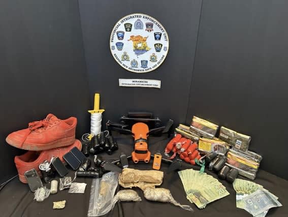 The estimated penitentiary value of the items seized is in excess of $250,000, according to police. (Miramichi Police Force/Facebook - image credit)