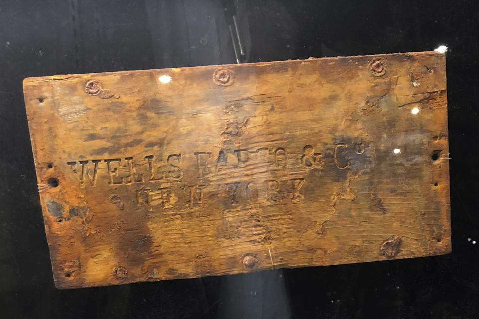 In this undated photo provided by Holabird Western Americana Collections is a lid to a Wells Fargo treasure shipment box, recovered from the fabled "Ship of Gold," the S.S. Central America that sank in 1857. The lid was sold at auction for $99,600 by Holabird Western Americana Collections in Reno, Nevada on December 3, 2022. (Holabird Western Americana Collections via AP)