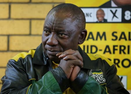 FILE PHOTO: President Cyril Ramaphosa waits to address an election rally for his ruling African National Congress (ANC) ahead of the country's May 8 poll, in Mitchells Plain near Cape Town, South Africa, May 3, 2019. REUTERS/Sumaya Hisham/File Photo