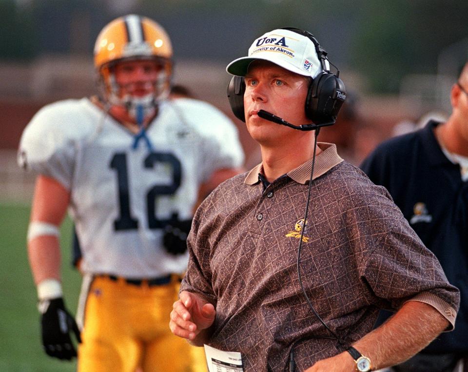 Akron Zips coach Lee Owens watches as his team is beaten 44-14 by the Ohio University Bobcats on August 29, 1996.