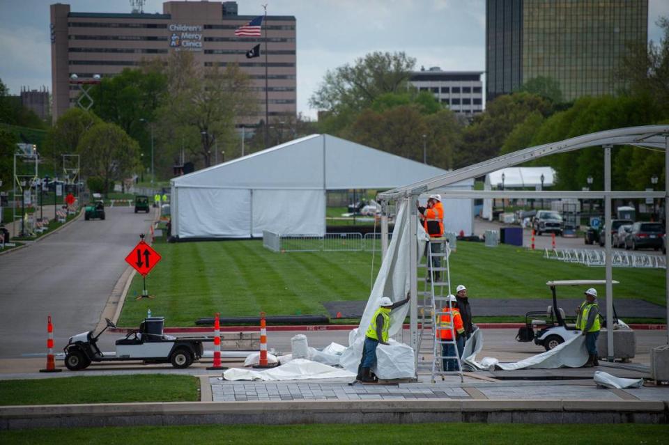 Workers constructed one of dozens of tents on the south lawn of the National WWI Museum and Memorial Thursday in preparation for the NFL Draft activities. The NFL Draft Experience, interactive football exhibits and games, will take place on the south lawn.