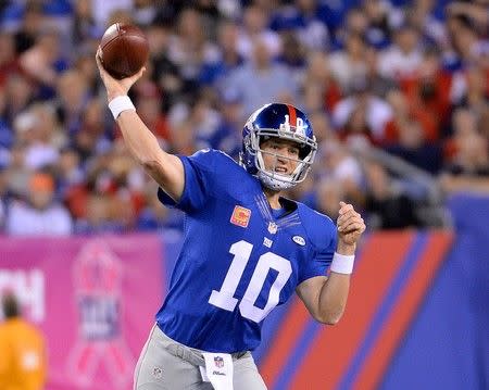 Oct 11, 2015; East Rutherford, NJ, USA; New York Giants quarterback Eli Manning (10) throws the ball against the San Francisco 49ers in the first half at MetLife Stadium. Mandatory Credit: Robert Deutsch-USA TODAY Sports