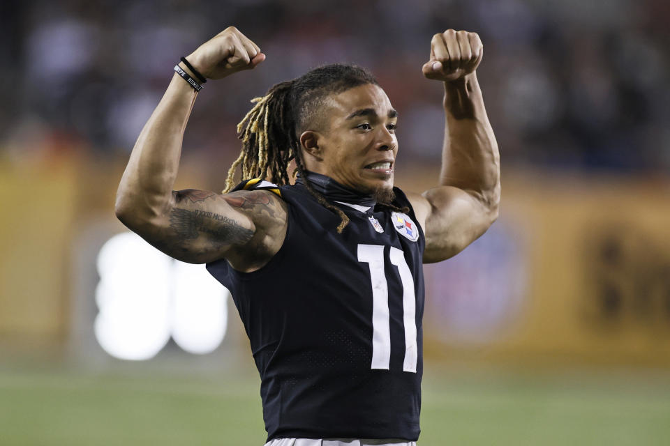 Pittsburgh Steelers wide receiver Chase Claypool celebrates after a four-yard touchdown run by running back Kalen Ballage during the second half of the Pro Football Hall of Fame NFL preseason game, Thursday, Aug. 5, 2021, in Canton, Ohio. (AP Photo/Ron Schwane)