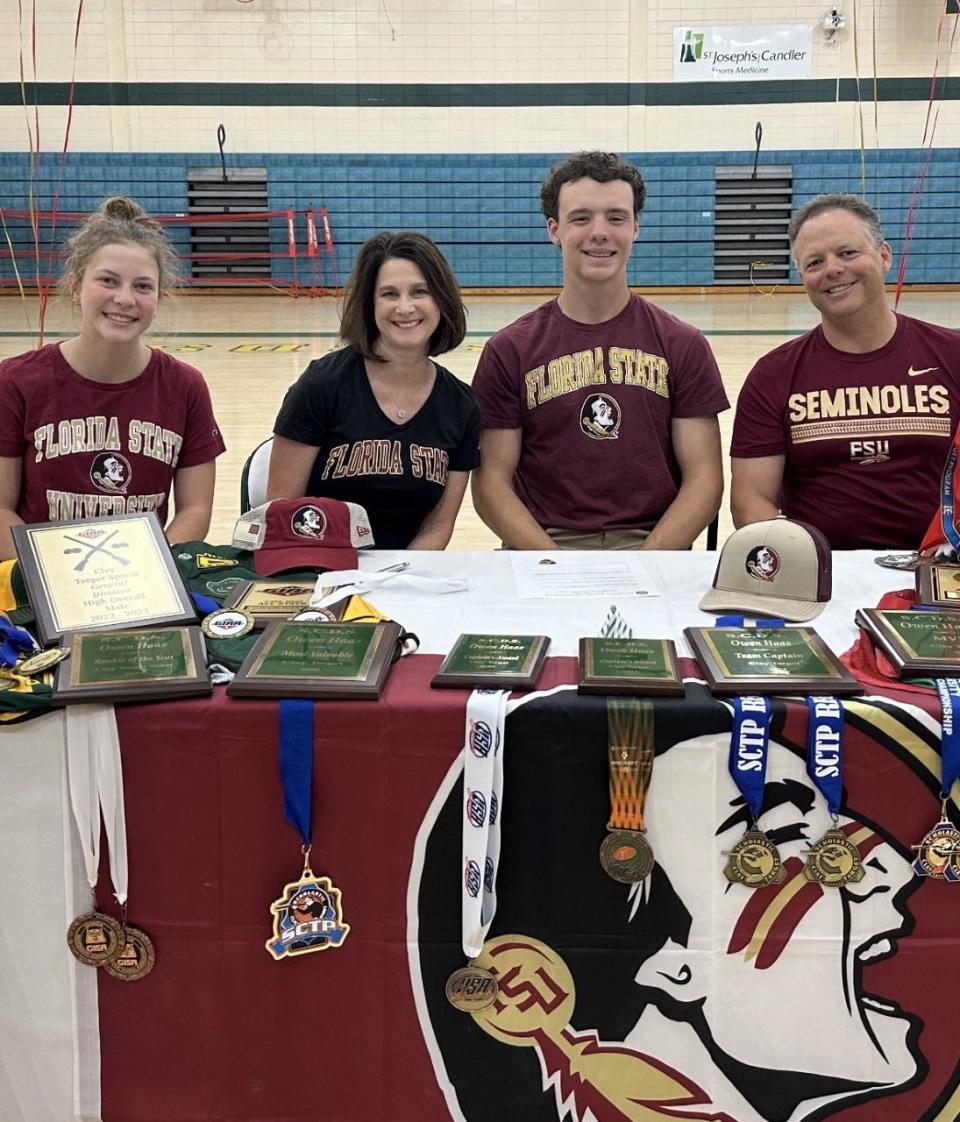 Owen Haas of Savannah Country Day with his family as he signed with the Florida State Skeet and Trap Club on March 21.