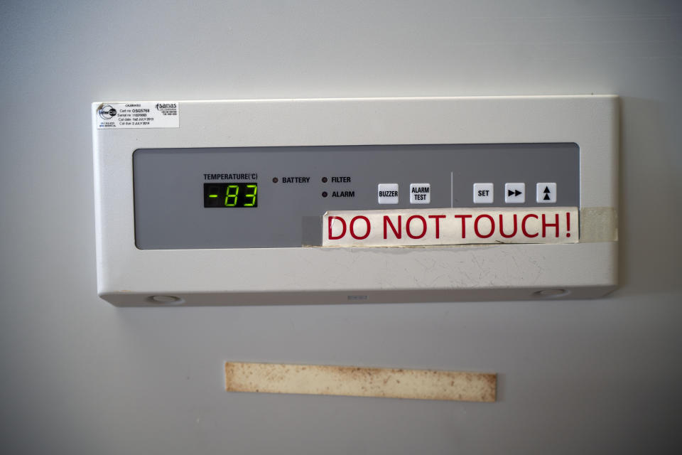 A thermometer display reads minus 83 degrees Celsius on a medical storage fridge at the Ndlovu clinic's lab in Groblersdal , 200 kms north-east of Johannesburg Thursday Feb. 11, 2021. African countries without the coronavirus variant dominant in South Africa should go ahead and use the AstraZeneca COVID-19 vaccine, the Africa Centers for Disease Control and Prevention said Thursday, while the World Health Organization suggested the vaccine even for countries with the variant circulating widely.(AP Photo/Jerome Delay)