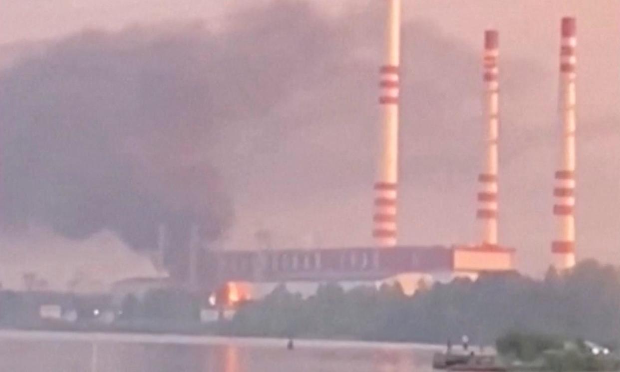 <span>Smoke rises from a fire at Konakovo power station in the Tver region of Russia after a Ukrainian drone attack.</span><span>Photograph: social media/Reuters</span>