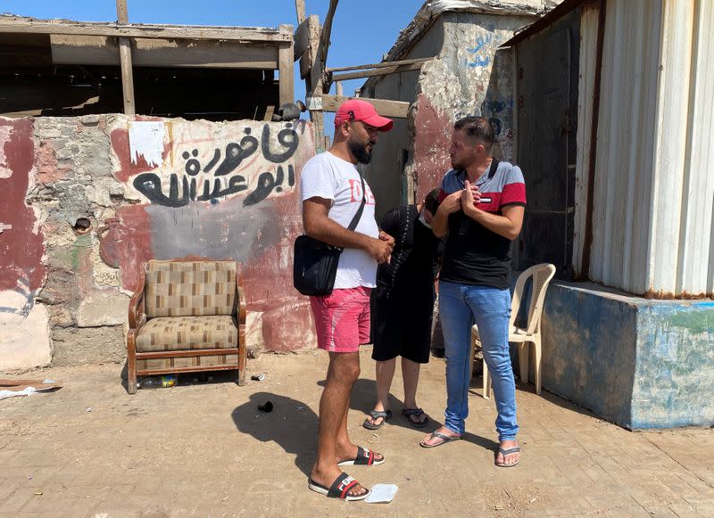 Chamseddine Khaled Kerdi and Mohammed Ghandour talk in Tripoli