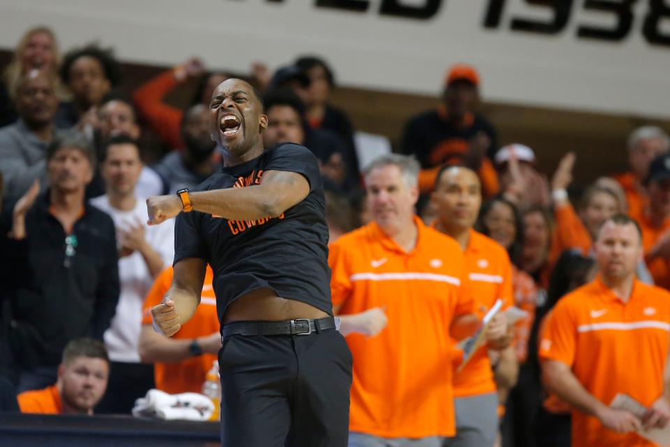 Oklahoma State Cowboys head coach Mike Boynton celebrates during a men's Bedlam college basketball game between the Oklahoma State University Cowboys (OSU) and the University of Oklahoma Sooners (OU) at Gallagher-Iba Arena in Stillwater, Okla., Wednesday, Jan. 18, 2023. Oklahoma State won 72-56.