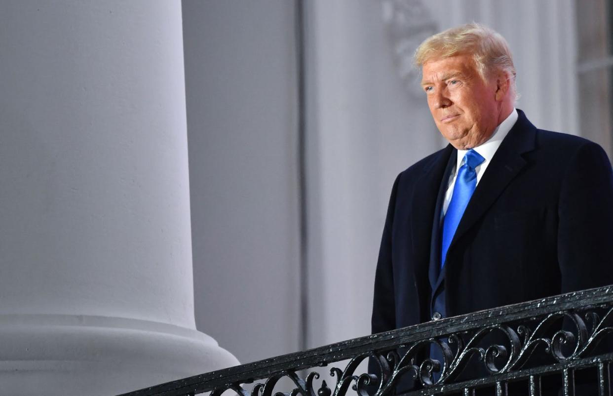 <span class="caption">Lord of all he surveys?</span> <span class="attribution"><a class="link " href="https://www.gettyimages.com/detail/news-photo/president-donald-trump-stands-on-the-white-house-balcony-news-photo/1229299863?adppopup=true" rel="nofollow noopener" target="_blank" data-ylk="slk:Nicholas Kamm/AFP via Getty Images;elm:context_link;itc:0;sec:content-canvas">Nicholas Kamm/AFP via Getty Images</a></span>