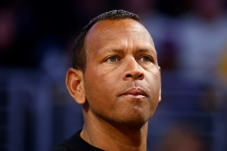 Retired Major League Baseball star Alex Rodriguez, watching a Minnesota Timberwolves NBA game, and partner Marc Lore will not be able to purchase a majority stake in the club, majority owner Glen Taylor said (RONALD MARTINEZ)