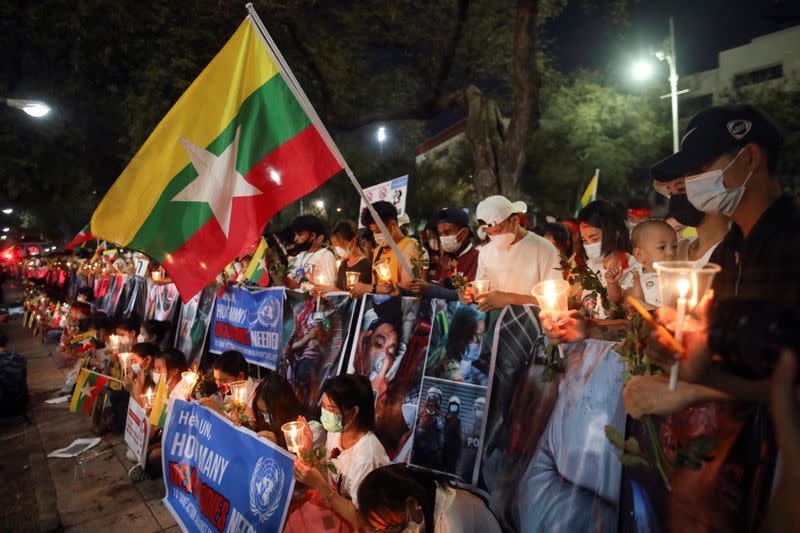 People attend prayer ceremony at U.N. building in Bangkok