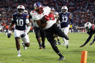 Western Kentucky tight end Joshua Simon (6) carries the ball in for a touchdown against Auburn during the first half of an NCAA college football game, Saturday, Nov. 19, 2022, in Auburn, Ala. (AP Photo/Butch Dill)