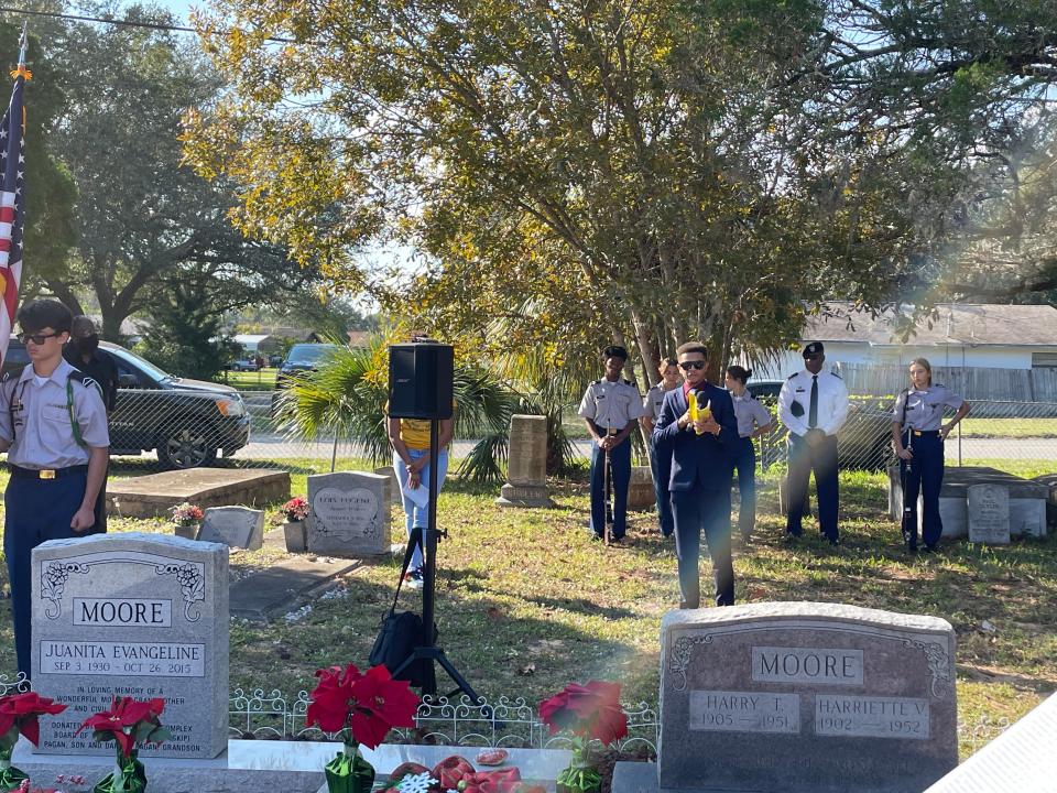 Isaiah Henry, a dual-enrolled student at Titusville High School and Eastern Florida State College, gave a tribute to the Moores at their annual gravesite memorial service Saturday.