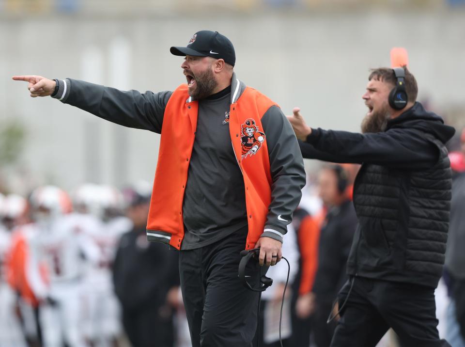 Massillon head football coach Nate Moore shouts to his team during the McKinley game, Saturday, Oct. 21, 2023, in Canton.