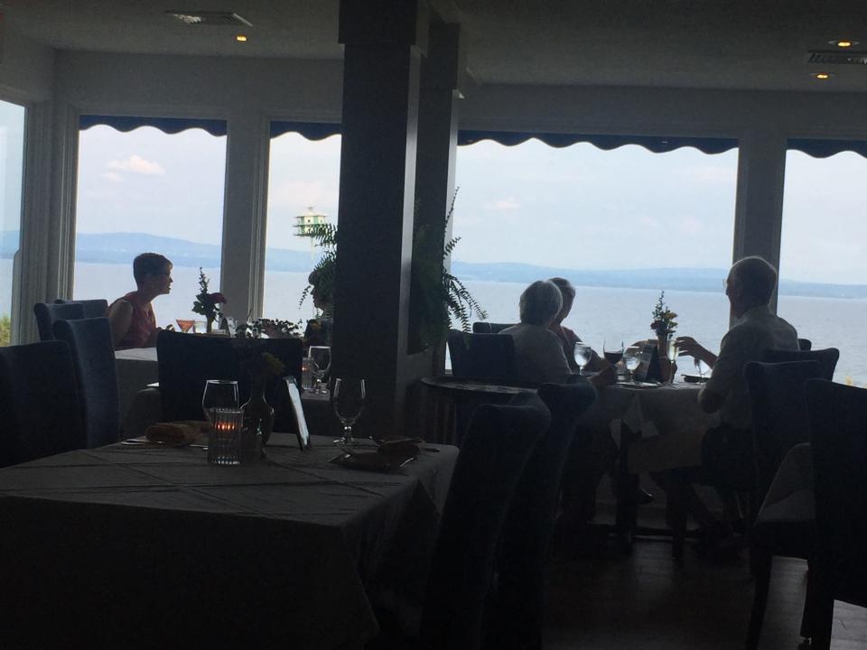 A view of the dining room that overlooks Lake Champlain from Shore Acres in North Hero, shown Aug. 9, 2021.