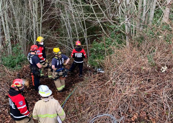 Crews from Tacoma Fire Department rescued two people Wednesday afternoon after their car went over an embankment near the 6600 block of North Marinera Street. 