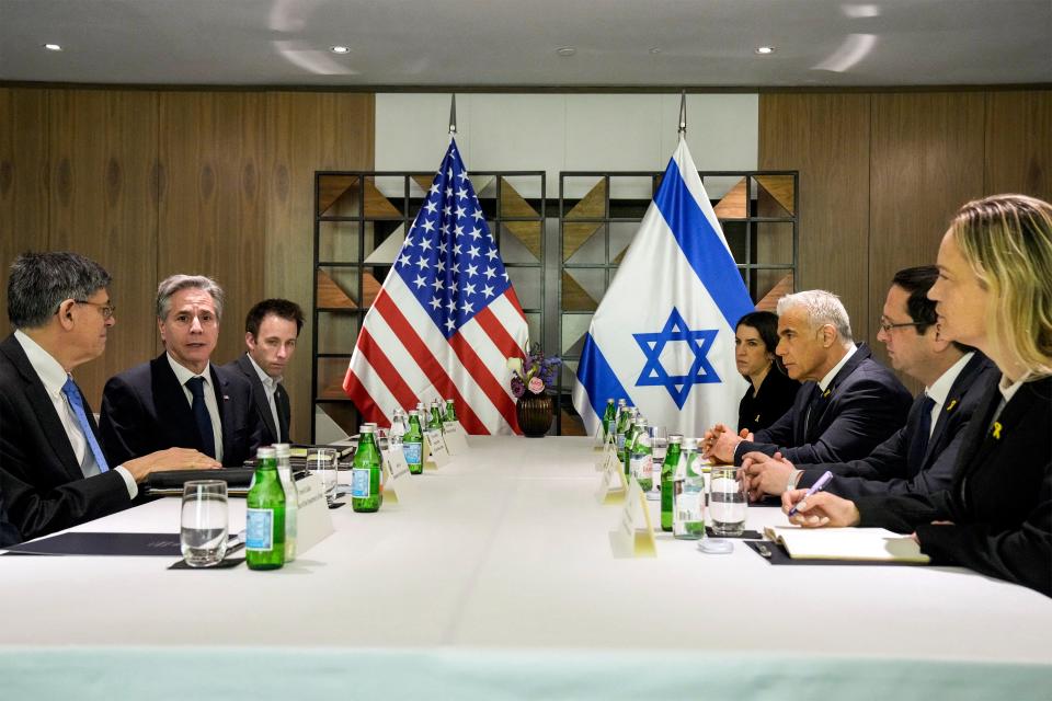 US Secretary of State Antony Blinken (2nd-L), accompanied by deputy chief of staff Tom Sullivan (3rd-L) and US Ambassador to Israel Jacob Lew (L), meets with Israeli officials in Tel Aviv on February 8, 2024.
