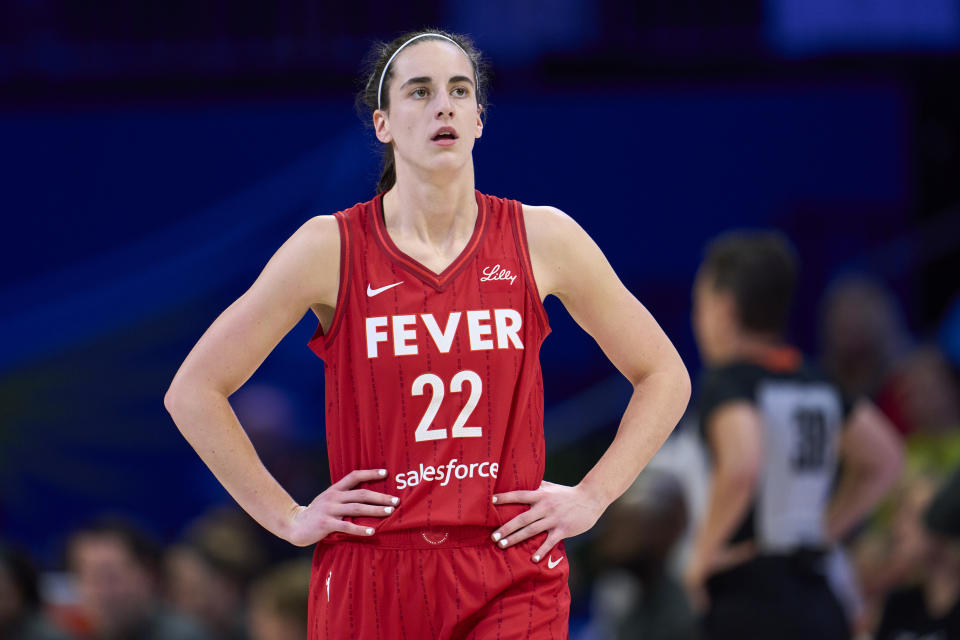 ARLINGTON, TEXAS - JULY 17: Caitlin Clark #22 of the Indiana Fever looks on against the Dallas Wings at the College Park Center on July 17, 2024 in Arlington, Texas. NOTE TO USER: User expressly acknowledges and agrees that by downloading and/or using this photo, User agrees to the terms and conditions of the Getty Images License Agreement. (Photo by Cooper Neill/Getty Images)