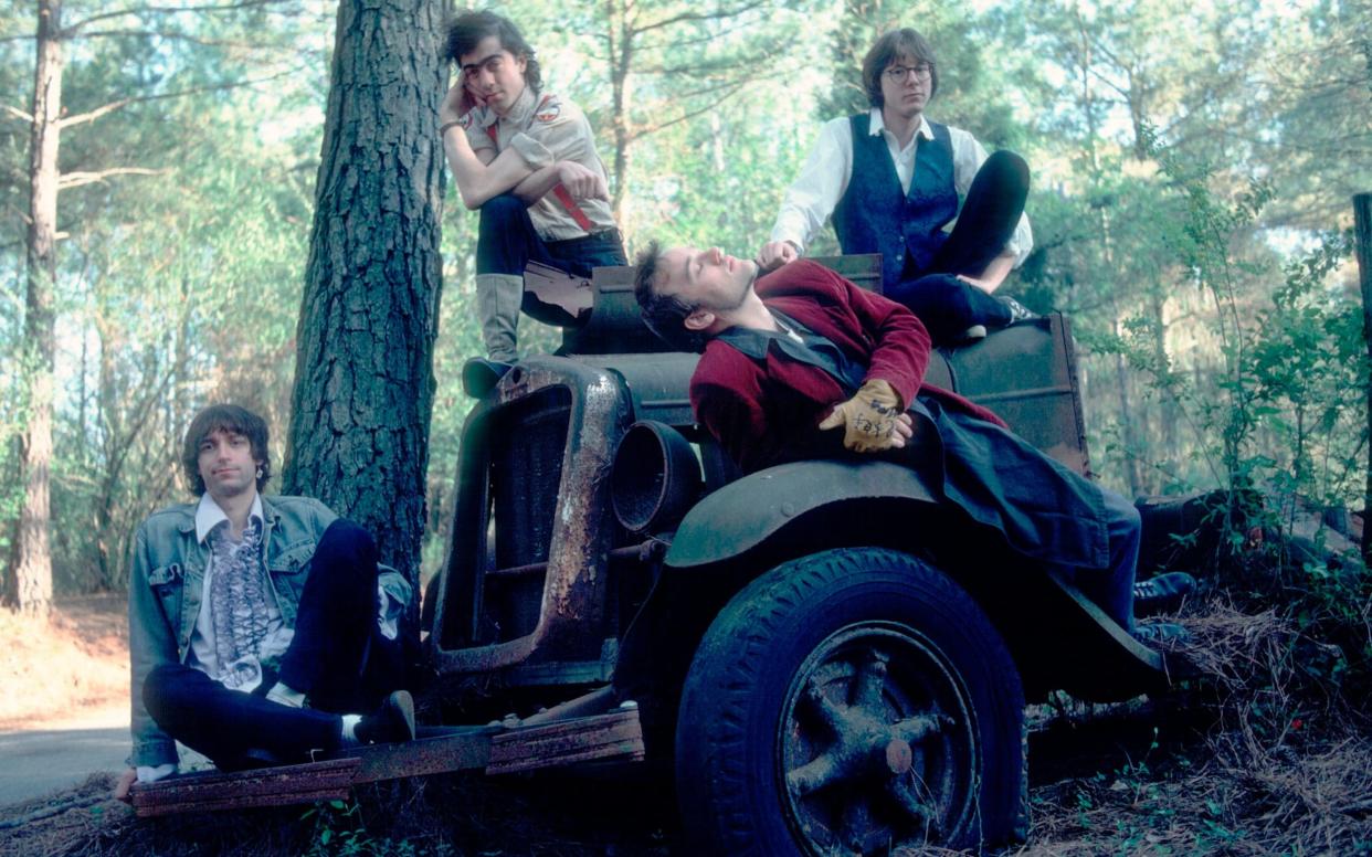 REM In 1995, with former drummer Bill Berry far right - Getty