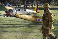 An airplane sits on the ground after crash landing at Penmar Golf Course in Venice, Los Angeles, California March 5, 2015. Actor Harrison Ford was injured on Thursday in the crash of a small airplane outside Los Angeles, celebrity website TMZ reported. Reuters could not immediately confirm the report on TMZ, which said that Ford, 72, suffered multiple gashes to his head and was taken to a nearby hospital for treatment. (REUTERS/Lucy Nicholson)