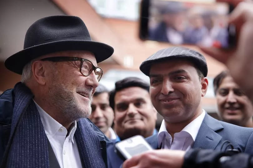 George Galloway MP with Shabaz Sarwar who unseated Manchester City Council's Deputy Leader Luthfur Rahman at Thursday's local elections -Credit:Sean Hansford | Manchester Evening News