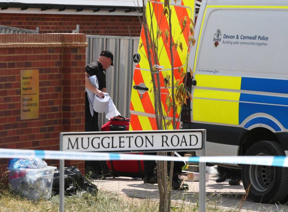 Police at the house in Muggleton Road, Amesbury where Dawn Sturgess and Charlie Rowley fell ill (PA)