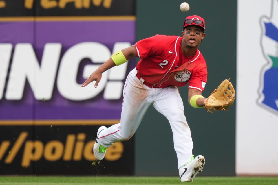 Cincinnati Reds right fielder Jose Barrero (2) catches a fly ball in the third inning during a MLB spring training baseball game against the Seattle Mariners, Monday, Feb. 26, 2024, at Goodyear Ballpark in Goodyear, Ariz.