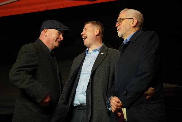 Mick Lynch and Eddie Dempsey of the RMT with former Labour Party leader Jeremy Corbyn 