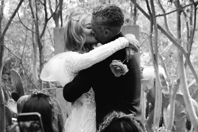 <p>Jack Gorlin</p> Rita Ora and Taika Waititi share a kiss during their wedding ceremony.