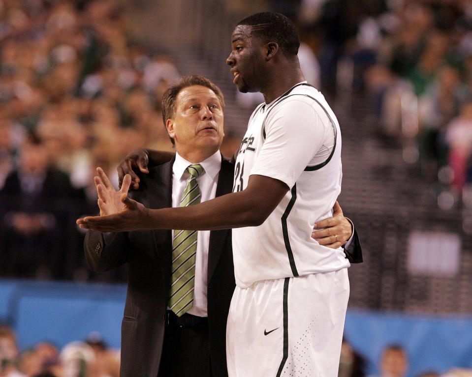 Michigan State head coach Tom Izzo talks with #23 Draymond Green during a time out in the second half.