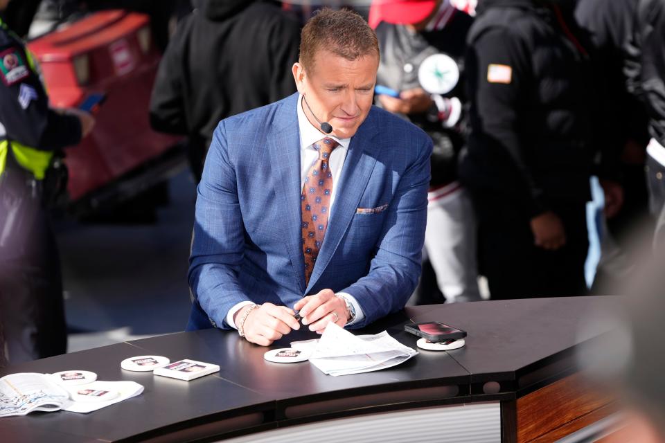 Oct 21, 2023; Columbus, Ohio, USA; ESPN sportscaster Kirk Herbstreit sits on the set of College Gameday during the NCAA football game between the Ohio State Buckeyes and the Penn State Nittany Lions at Ohio Stadium.
