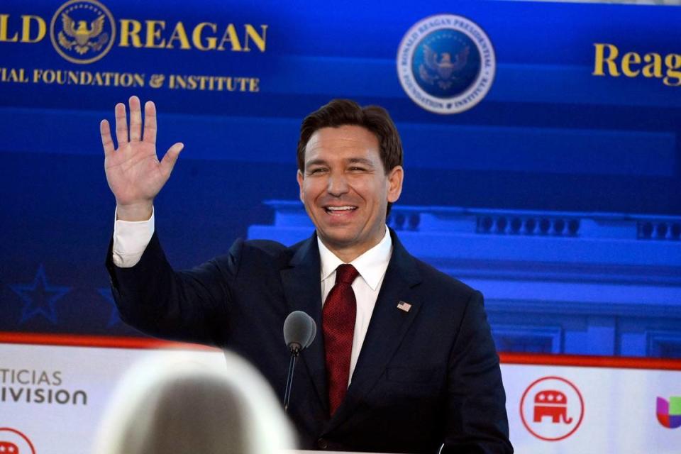 Ron DeSantis appears on stage at the start of the Fox Business Republican presidential primary debate at the Ronald Reagan Presidential Library and Museum.