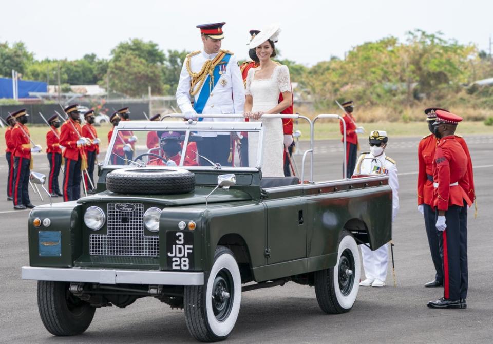 William and Kate are driven off the Kingston parade ground in a special Land Rover following the passing out parade. (Jane Barlow/PA) (PA Wire)