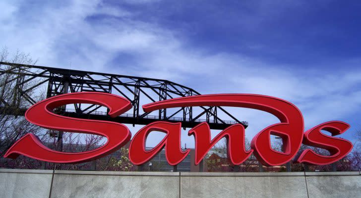 a red sign with the Las Vegas Sands (LVS) logo