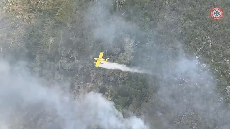 Smoke rises from bushfires on Fraser Island, Queensland, Australia