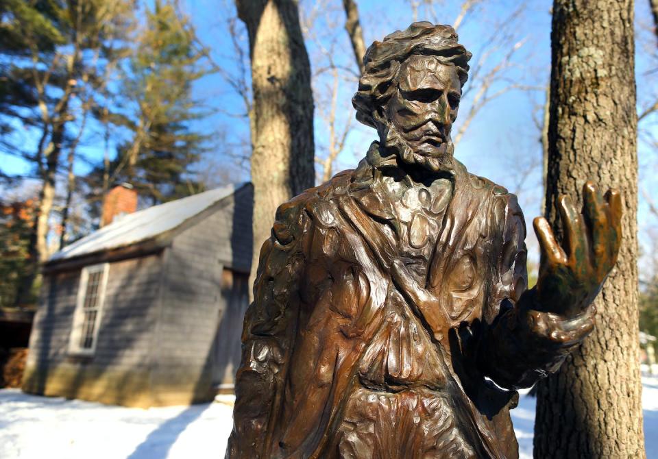 Statue of Henry David Thoreau. <a href="https://www.gettyimages.co.uk/detail/news-photo/statue-of-henry-david-thoreau-in-front-of-a-reproduction-of-news-photo/545147840?adppopup=true" rel="nofollow noopener" target="_blank" data-ylk="slk:John Tlumacki/The Boston Globe via Getty Images;elm:context_link;itc:0;sec:content-canvas" class="link ">John Tlumacki/The Boston Globe via Getty Images</a>