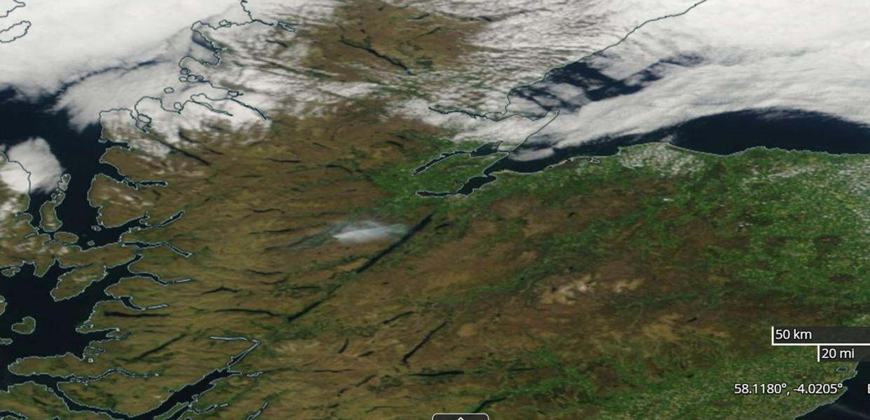 Screenshot from Nasa worldview satellite showing the plume of smoke (centre) from the fire at Cannich. (PA)