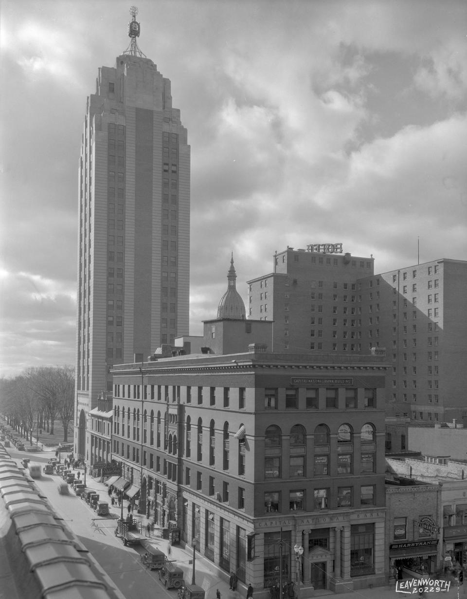 A 1931 photo of the Capitol National Bank, now Boji Tower, with a view of Allegan Street heading toward Capitol Avenue downtown.