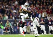 <p>Oakland Raiders tight end Mychal Rivera (81) is tackled by Houston Texans defensive back Eddie Pleasant (35) during the fourth quarter of the AFC Wild Card playoff football game at NRG Stadium. Mandatory Credit: Troy Taormina-USA TODAY Sports </p>