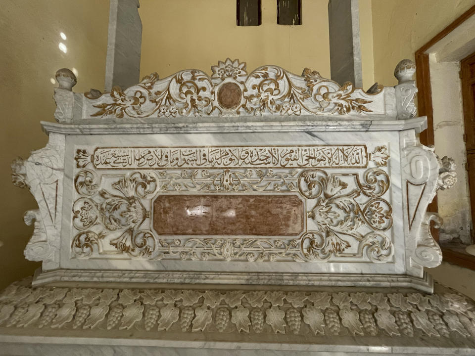 A carved and decorated grave marker is seen at Hussein Omar's family mausoleum, built in 1924 in a new-Islamic style housing the graves of a number of prominent Egyptians from a century ago, in Cairo's historic City of the Dead, Egypt, Sept. 1, 2023. Authorities have already razed hundreds of tombs and mausoleums as they carry out plans to build a network of multilane highways through the City of the Dead, a vast cemetery in the Egyptian capital that has been in use for more than a millennium. (AP Photo/Amr Nabil)