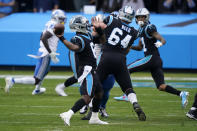 Carolina Panthers quarterback P.J. Walker throws his first NFL touchdown past during the second half of an NFL football game against the Detroit Lions Sunday, Nov. 22, 2020, in Charlotte, N.C. (AP Photo/Gerry Broome)