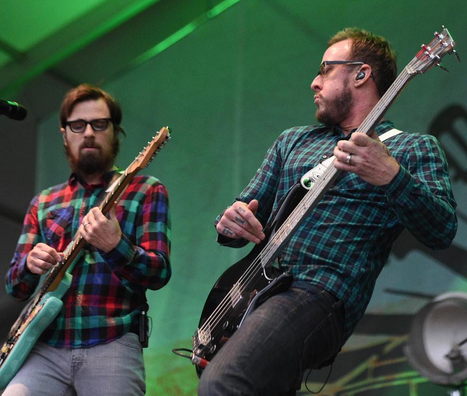 Rivers Cuomo, left, and Scott Shriner of Weezer. The band will head out on its 22-date Voyage to the Blue Planet Tour in late 2024 to celebrate the 30th anniversary of its debut album.