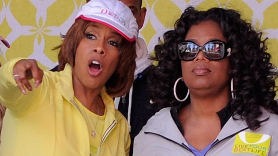 Media personalities Gayle King and Oprah Winfrey observe the crowd at the completion of the “Live Your Best Life Walk” to celebrate O, The Oprah Magazine’s 10th anniversary in Times Square in May 2010 in New York City. (Photo by Jemal Countess/Getty Images)