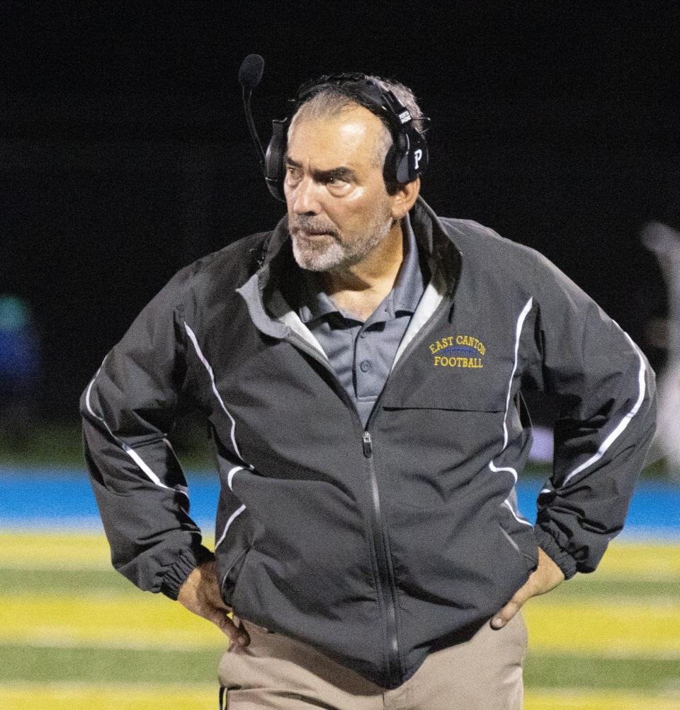 East Canton’s head coach John “Spider” Miller on the sideline during a game against Tuscarawas Central Catholic on Friday, Oct. 8, 2021.