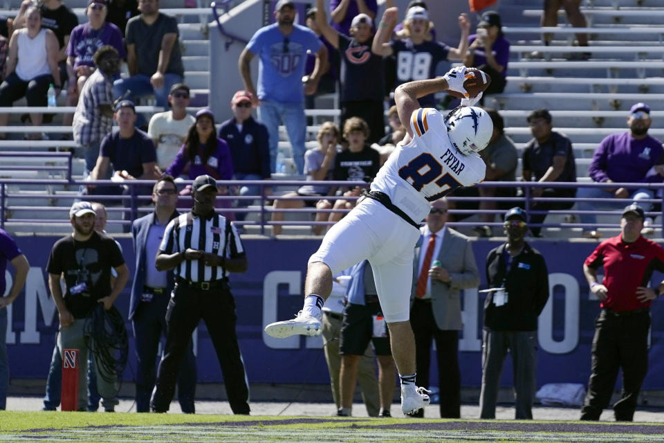 UTEP tight end Zach Fryar catches a touchdown pass during the first half of an NCAA college football game against Northwestern, Saturday, Sept. 9, 2023, in Evanston, Ill. (AP Photo/Erin Hooley)