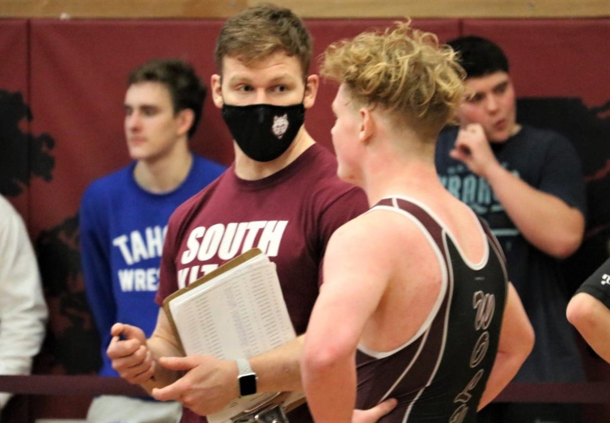 South Kitsap's Conner Hartmann is in his first season as head coach for the Wolves. The former South Kitsap state champion earned All-American status three times at Duke University.