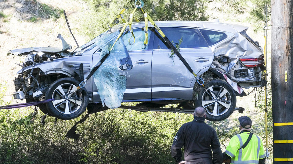 A crane, pictured here lifting Tiger Woods' vehicle following the crash.